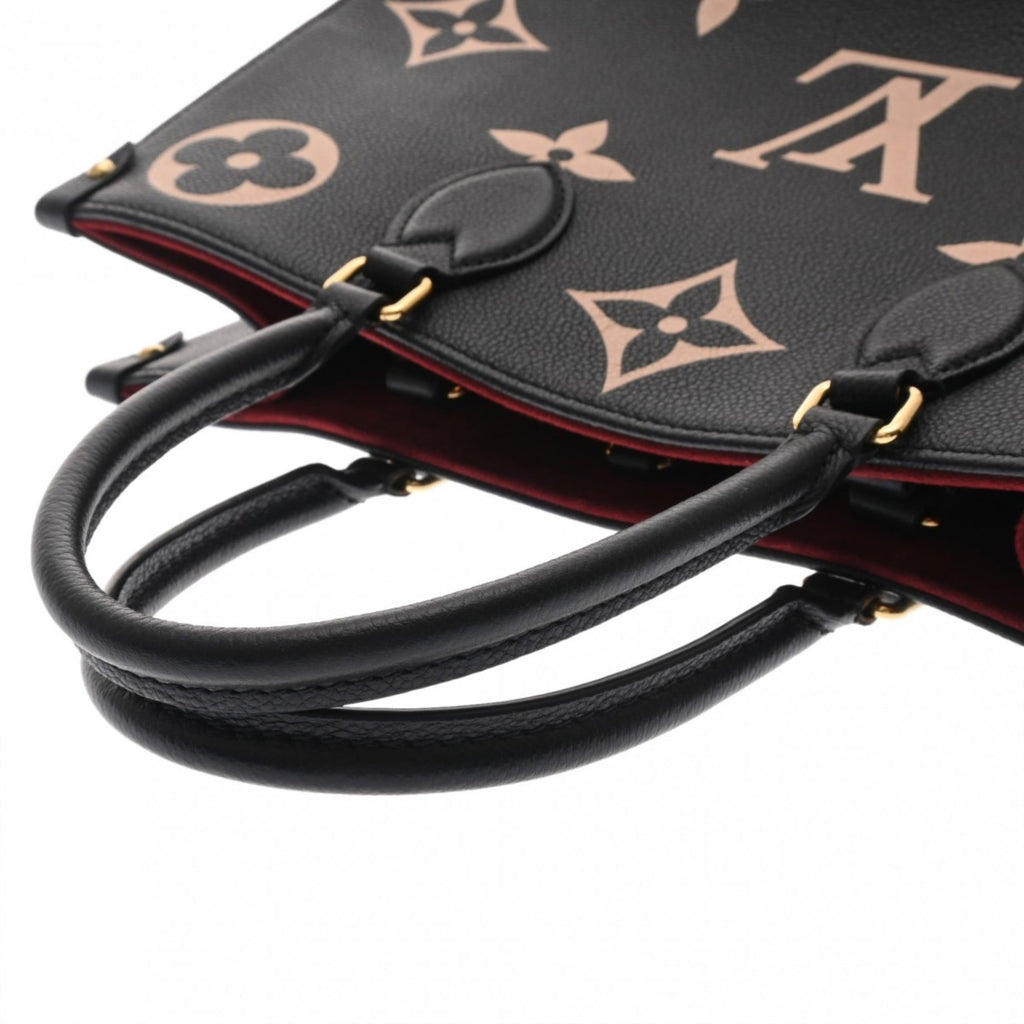 Louis Vuitton Beige Black Leather Handbag (Pre-Owned)