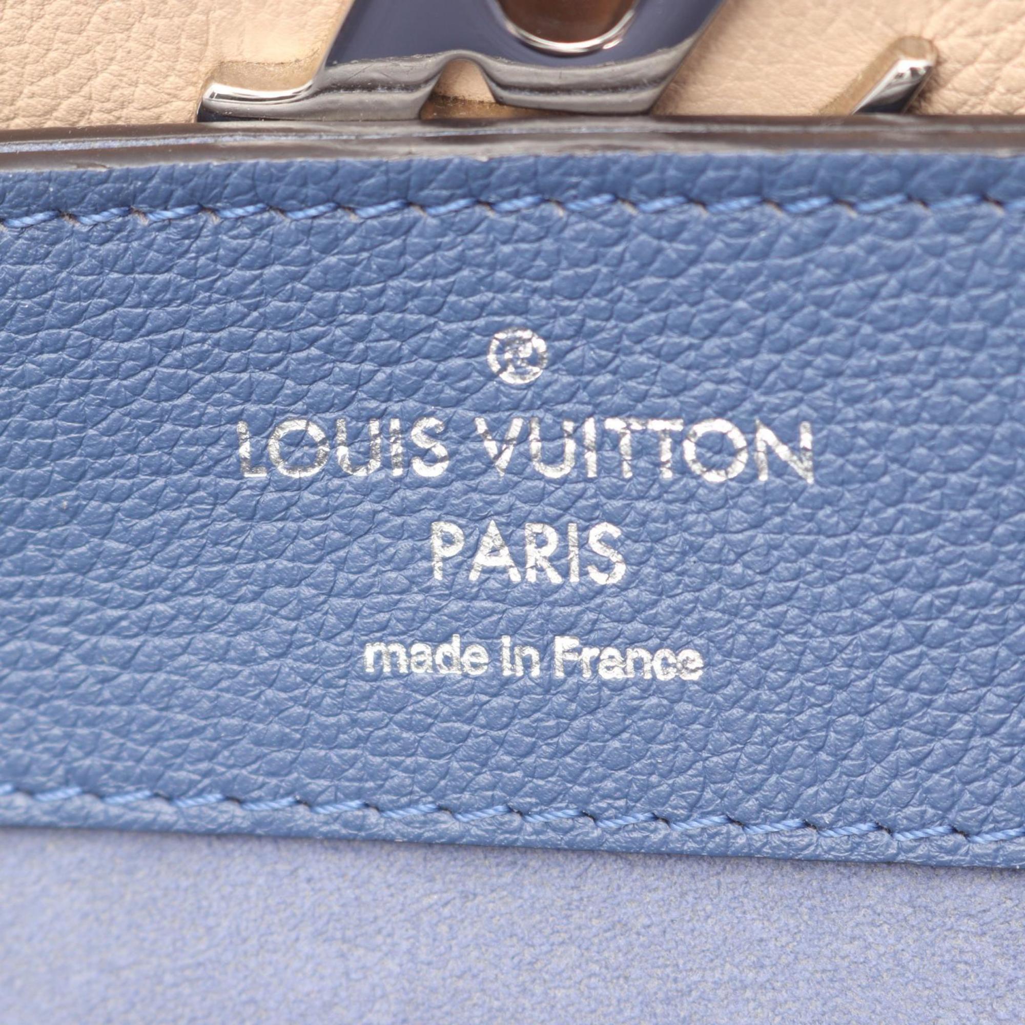 Louis Vuitton Beige Blue Leather Backpack (Pre-Owned)