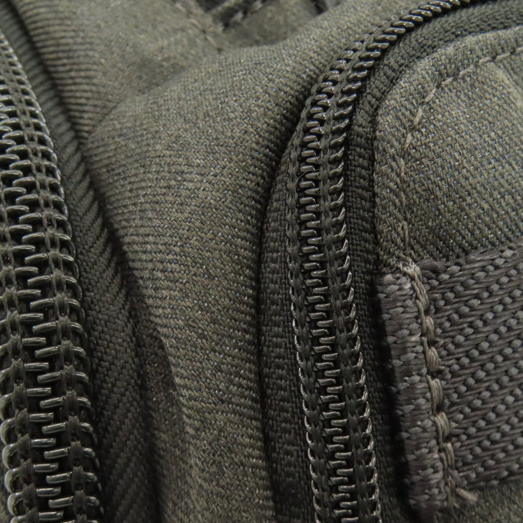 Tumi Black Canvas Sling Bag (Pre-Owned)