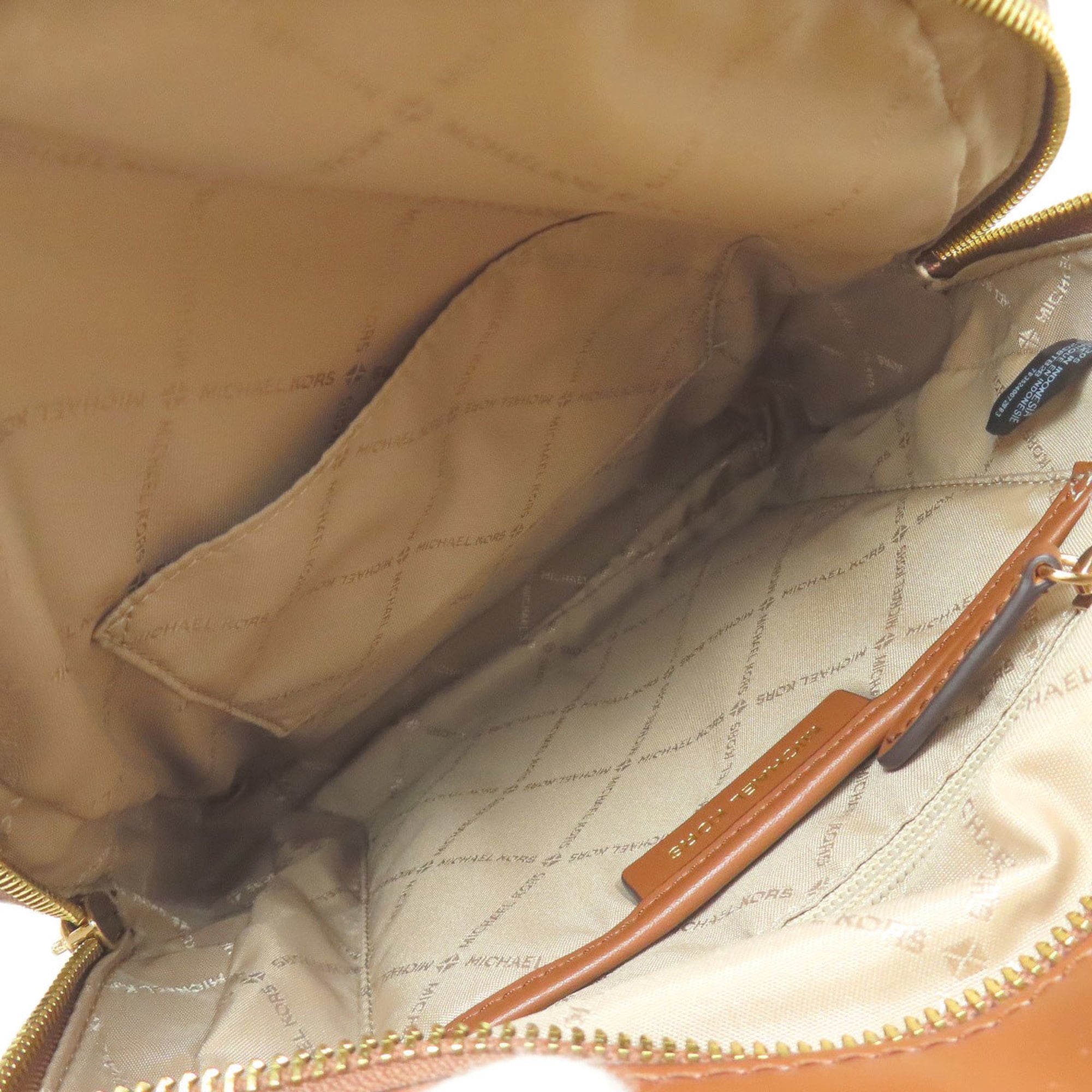 Michael Kors Brown White Leather Pvc Backpack (Pre-Owned)