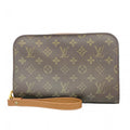 Louis Vuitton Brown Clutch Bag (Pre-Owned)