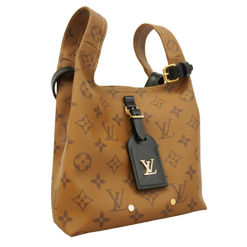 Louis Vuitton Brown Handbag (Pre-Owned)