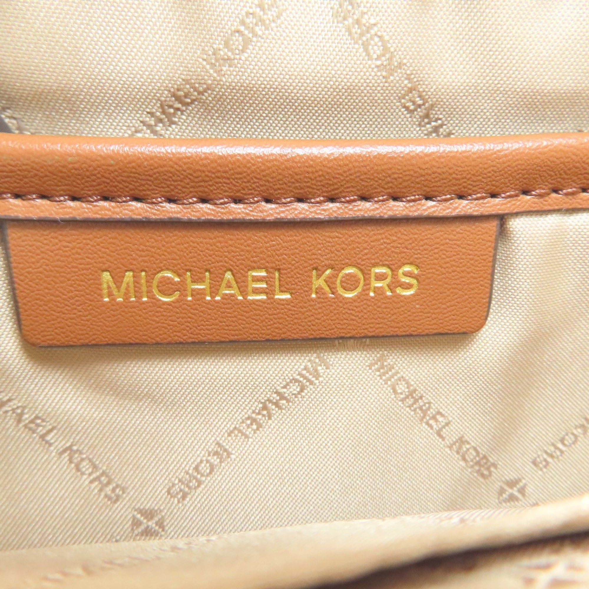 Michael Kors Brown White Leather Pvc Backpack (Pre-Owned)