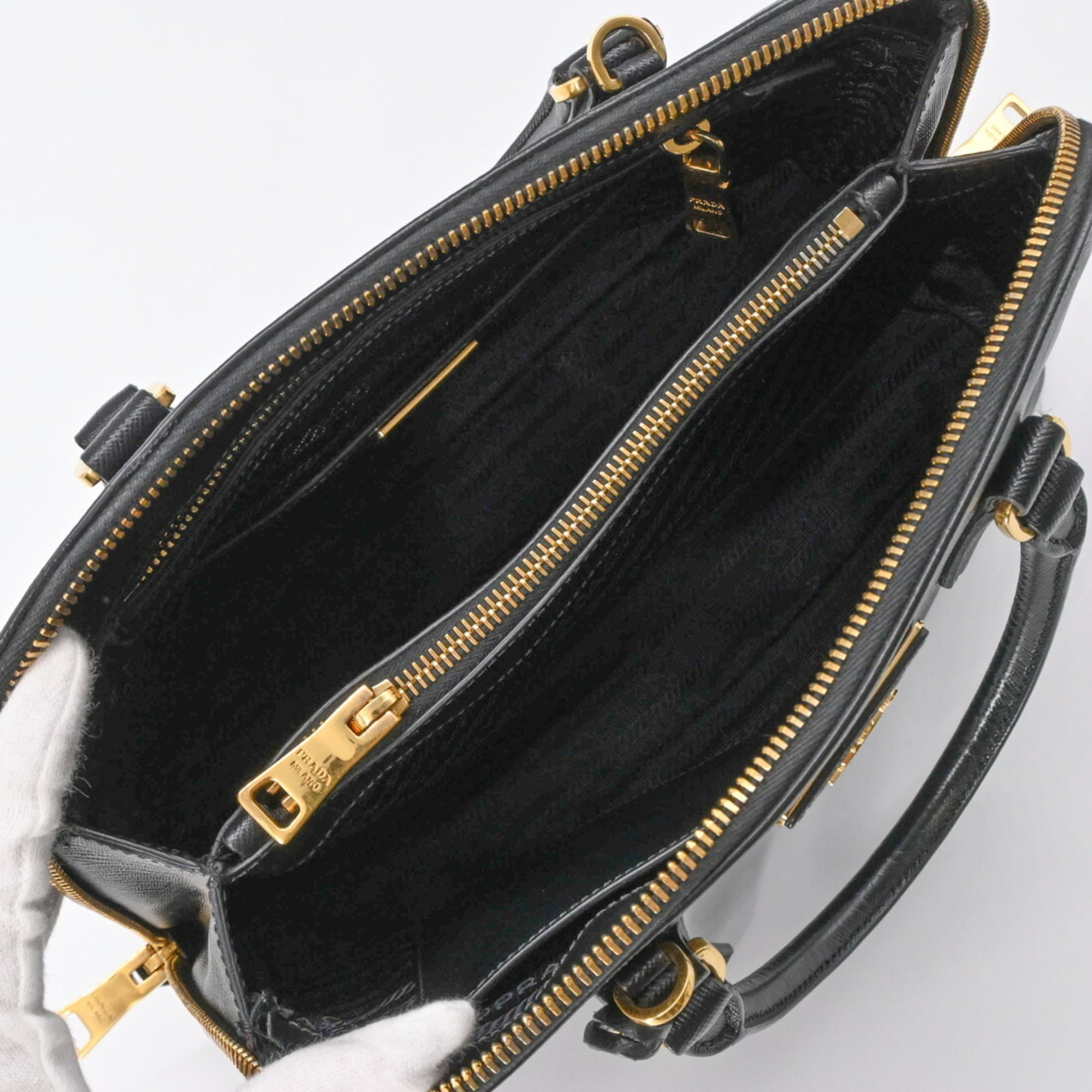 Prada Black Saffiano Triangle Handbag (Pre-Owned)