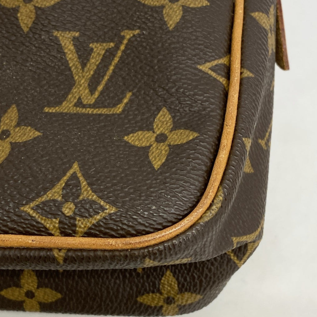 Louis Vuitton Brown Clutch Bag (Pre-Owned)