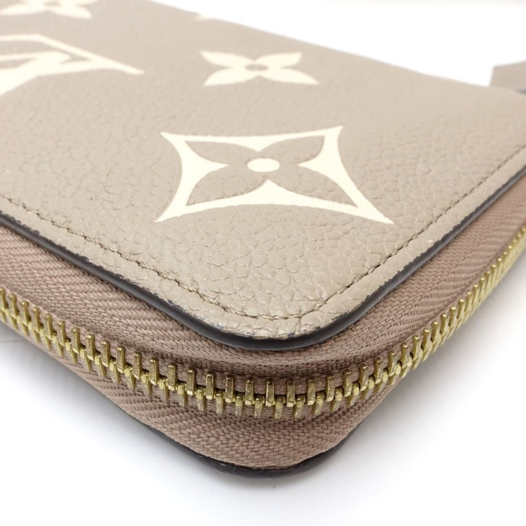 Louis Vuitton Monogram Bicolor Tourterelle Monogram Empreinte Long Wallet (Bi-Fold) (Pre-Owned)