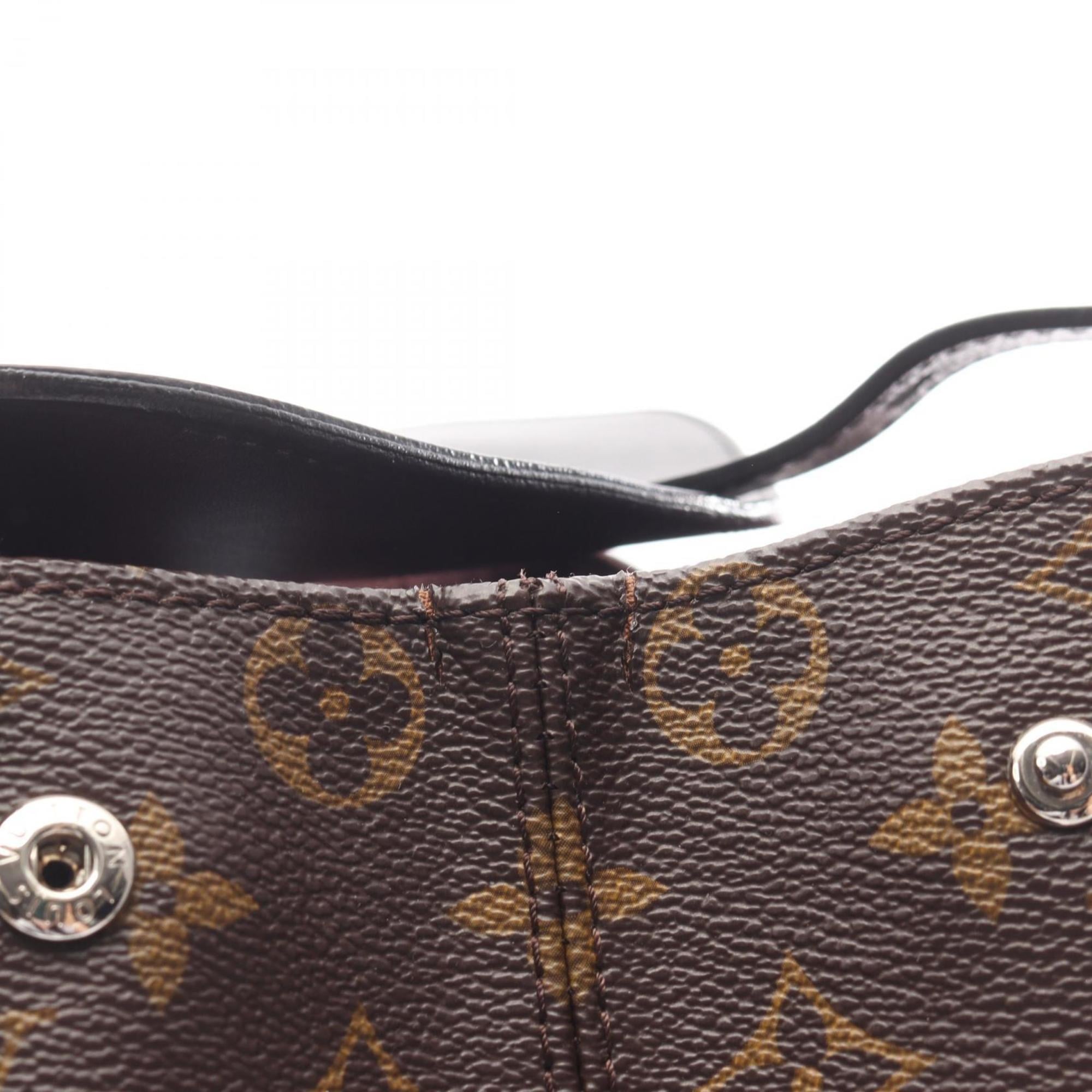 Louis Vuitton Black Brown Monogram Leather Backpack (Pre-Owned)