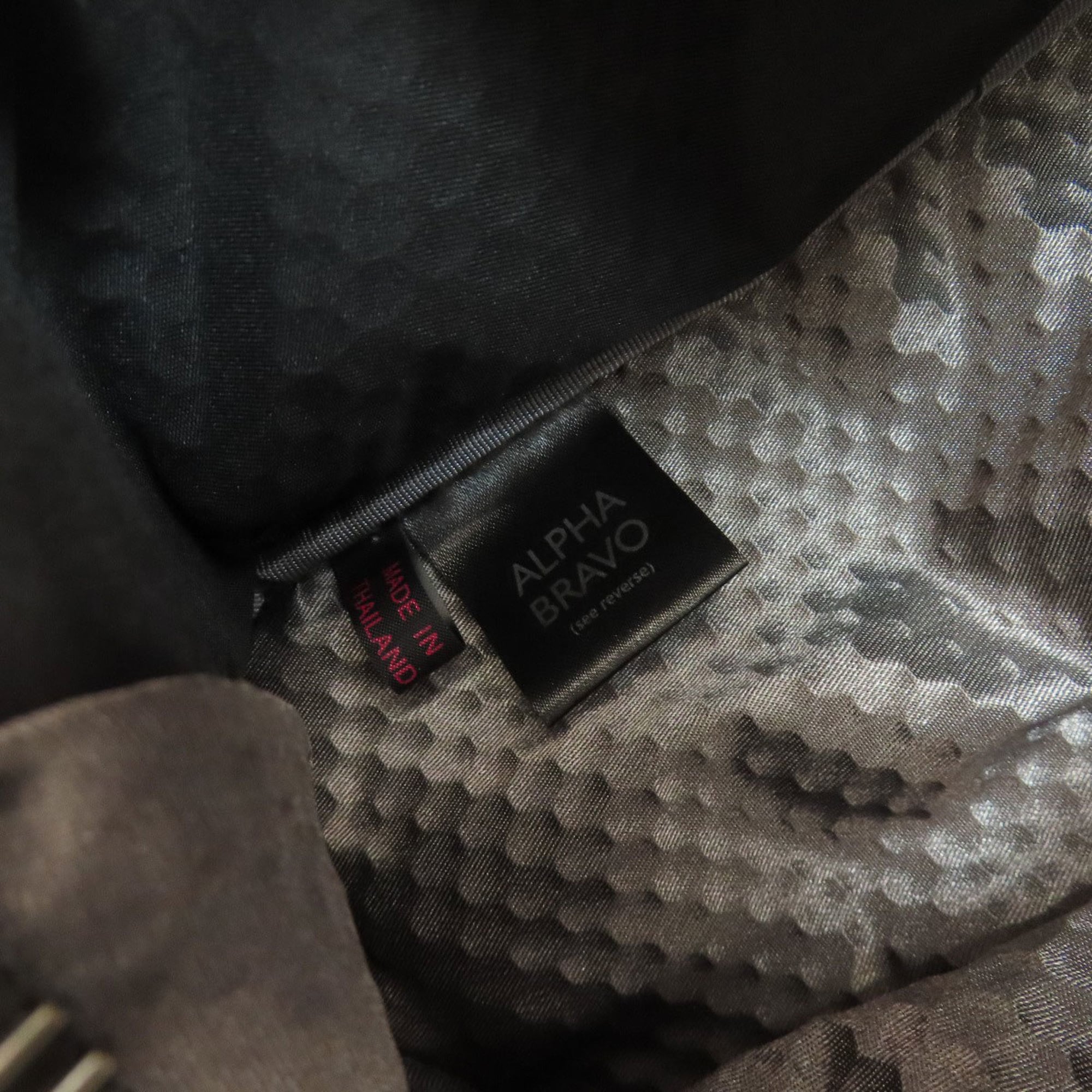 Tumi Black Canvas Sling Bag (Pre-Owned)