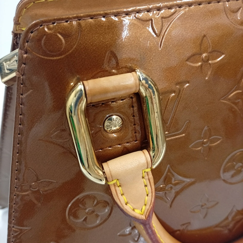 Louis Vuitton Bronze Vernis Handbag (Pre-Owned)