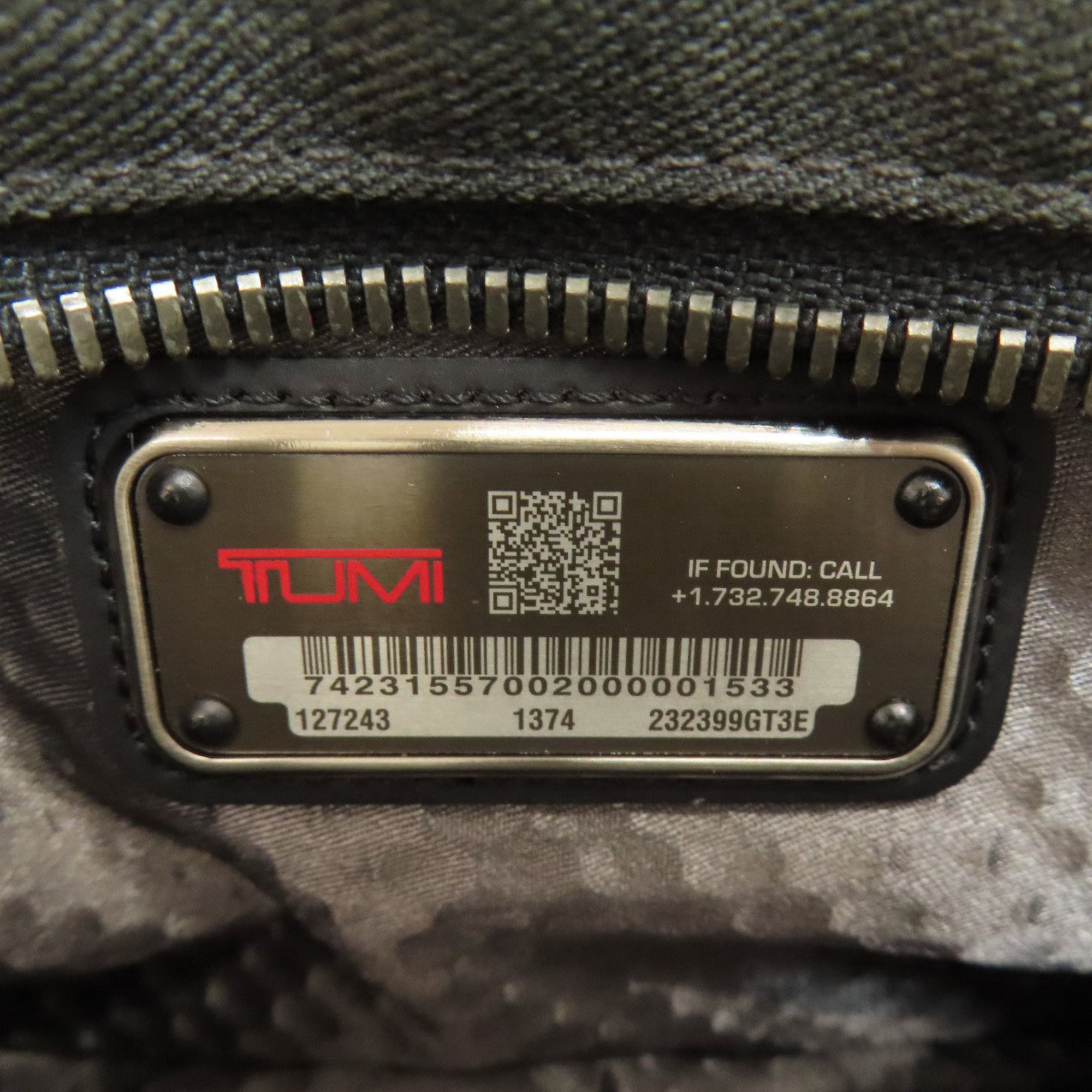 Tumi Black Canvas Sling Bag (Pre-Owned)