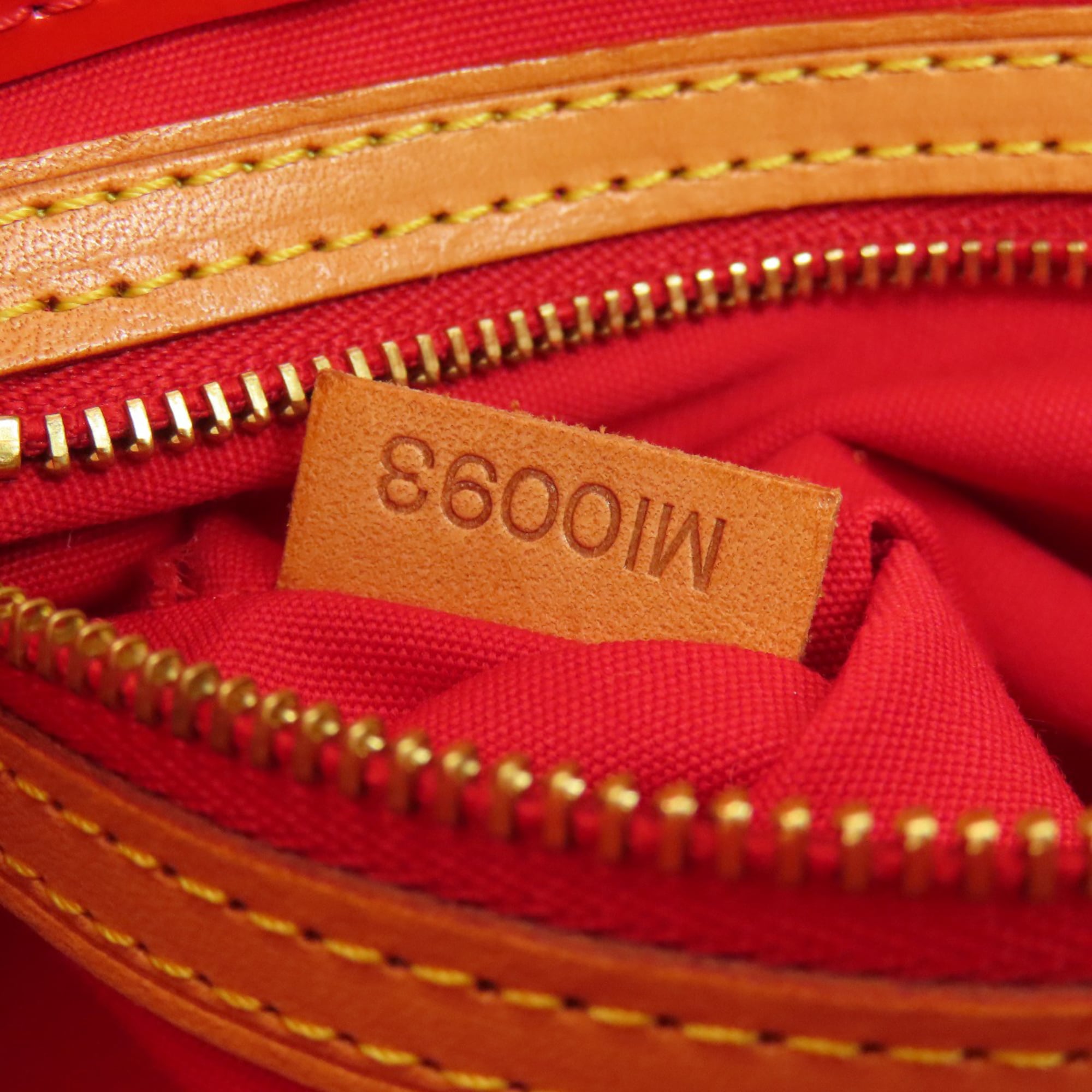 Louis Vuitton Rouge Vernis Handbag (Pre-Owned)