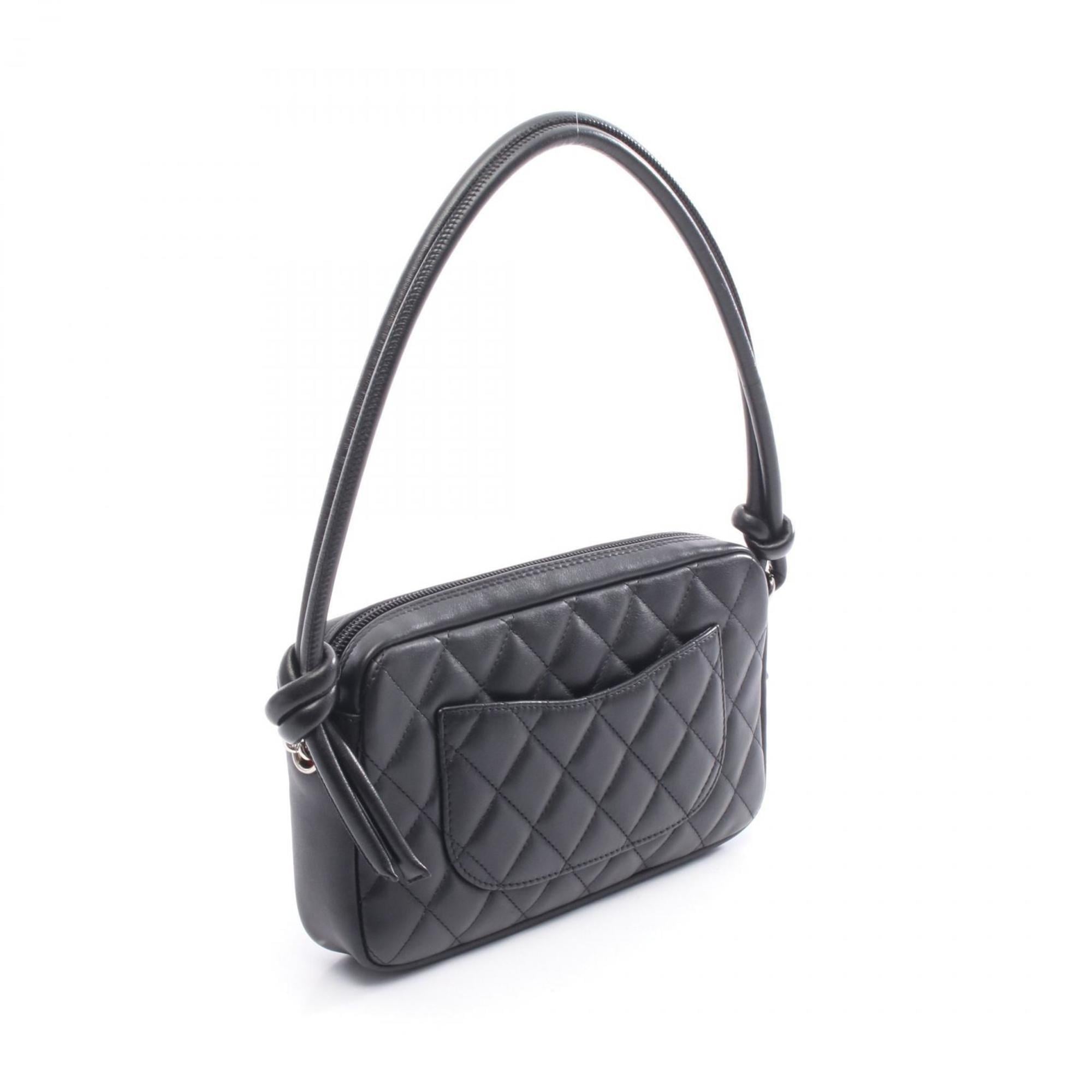 Chanel Black White Leather Handbag (Pre-Owned)