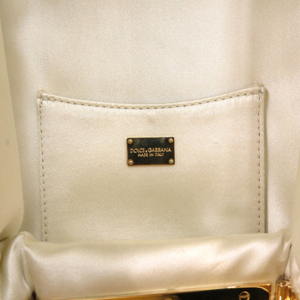 Dolce & Gabbana Off-White Metal Leather Clutch Bag (Pre-Owned)
