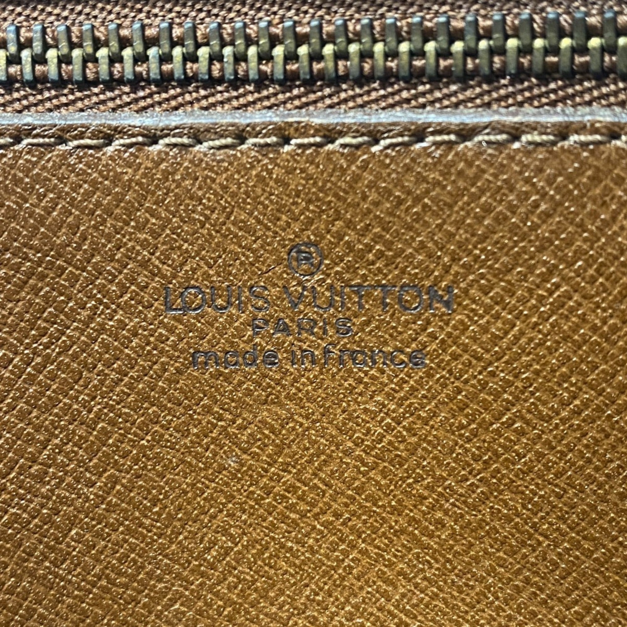 Louis Vuitton Brown Clutch Bag (Pre-Owned)