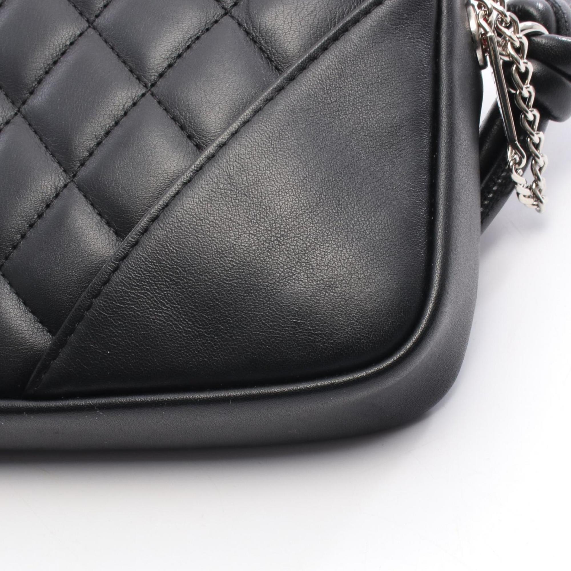 Chanel Black White Leather Handbag (Pre-Owned)