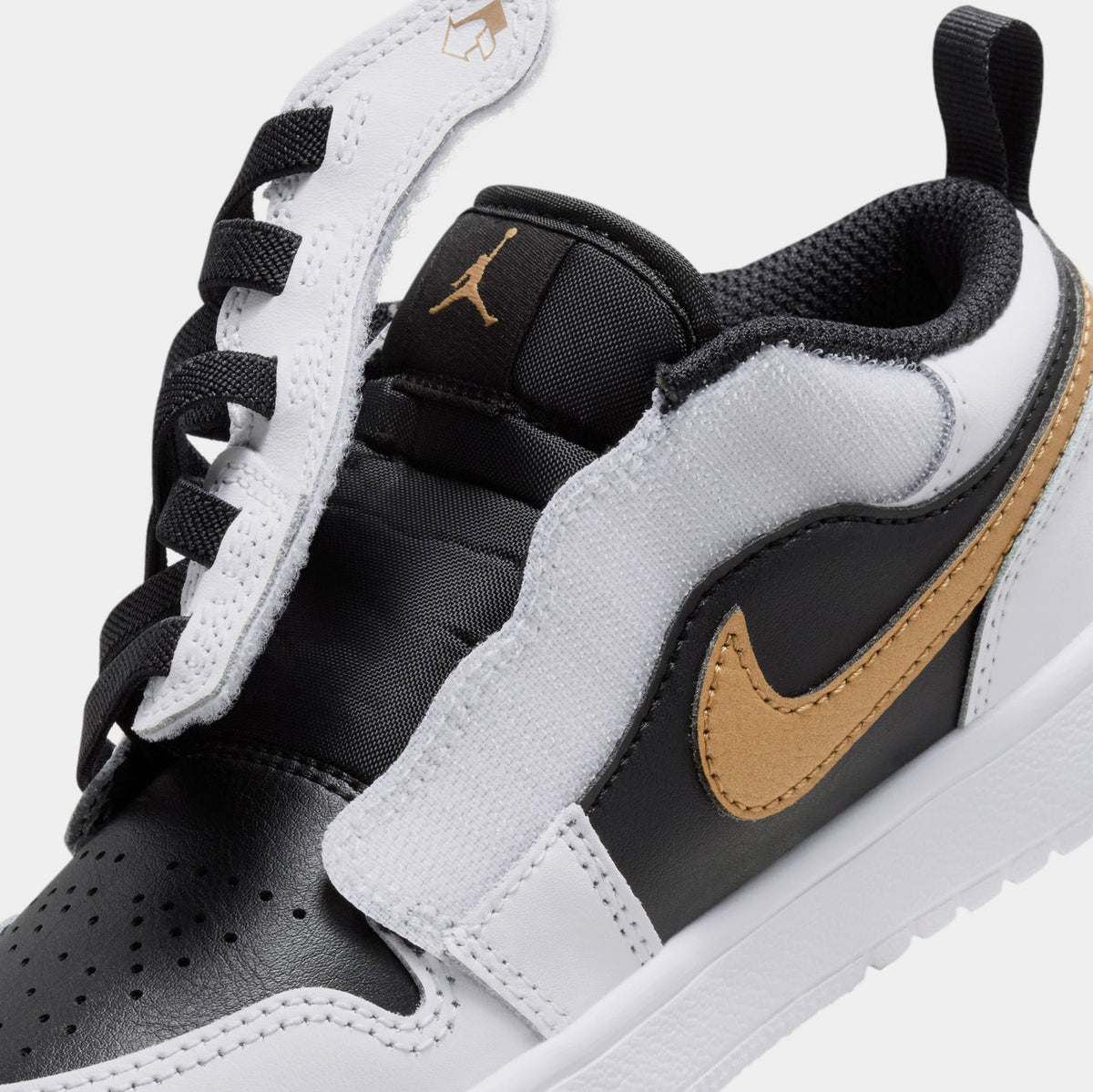 Exclusive Air Jordan 1 Low ALT Preschool Lifestyle Shoes (White/Black/Metallic Gold) — 10.5C — Side View