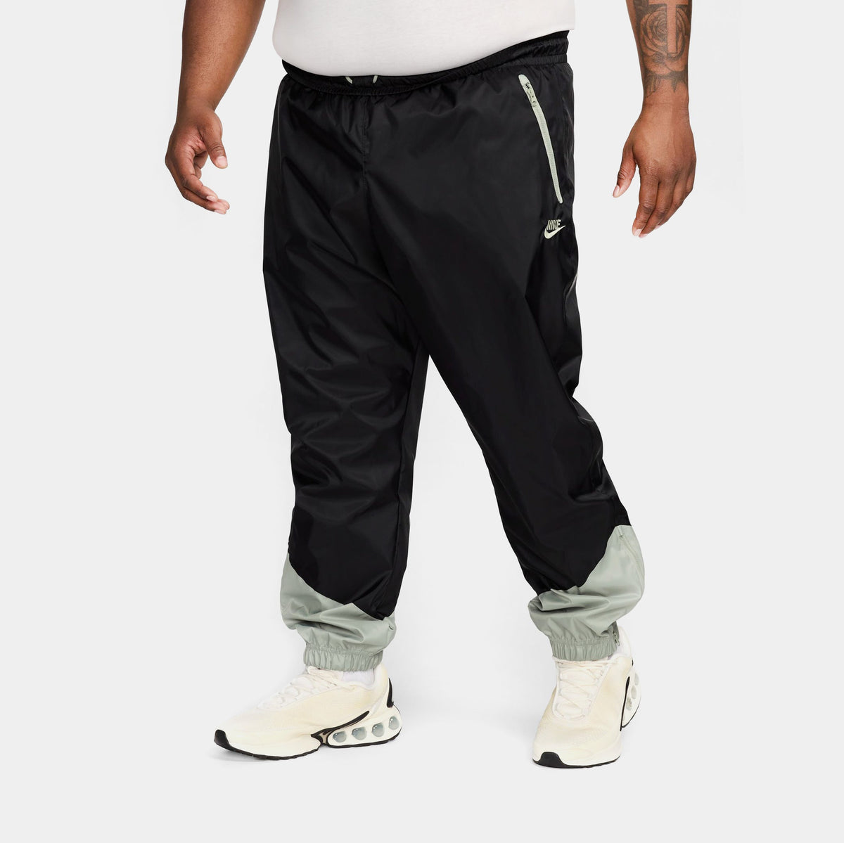Exclusive NSW Woven Lined Mens Pants (Black/Green) — S — Front View