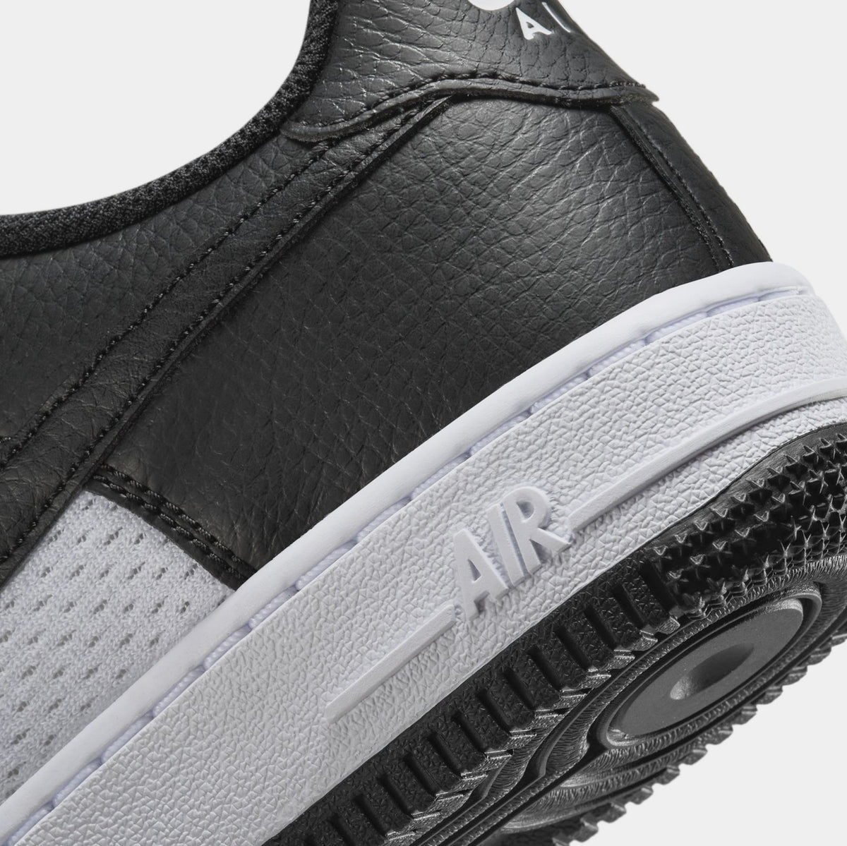 Exclusive Air Force 1 Low Grade School Lifestyle Shoes (Black/White) — 1Y — Back View