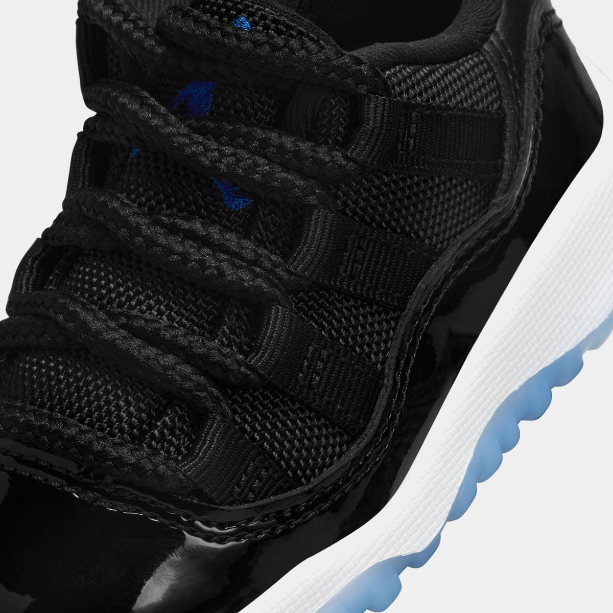 Exclusive Air Jordan 11 Retro Low Black and Varsity Royal Infant Toddler Lifestyle Shoes (Black/Varsity Royal/White) — 2C — Side View