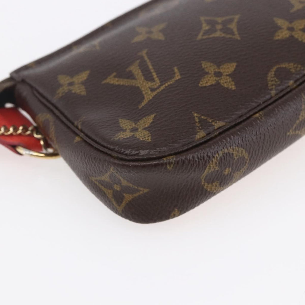 Louis Vuitton Pochette Accessoires Limited Edition Christmas Animation Monogram Canvas Brown Canvas Clutche & Pouche Bag (Pre-Owned)