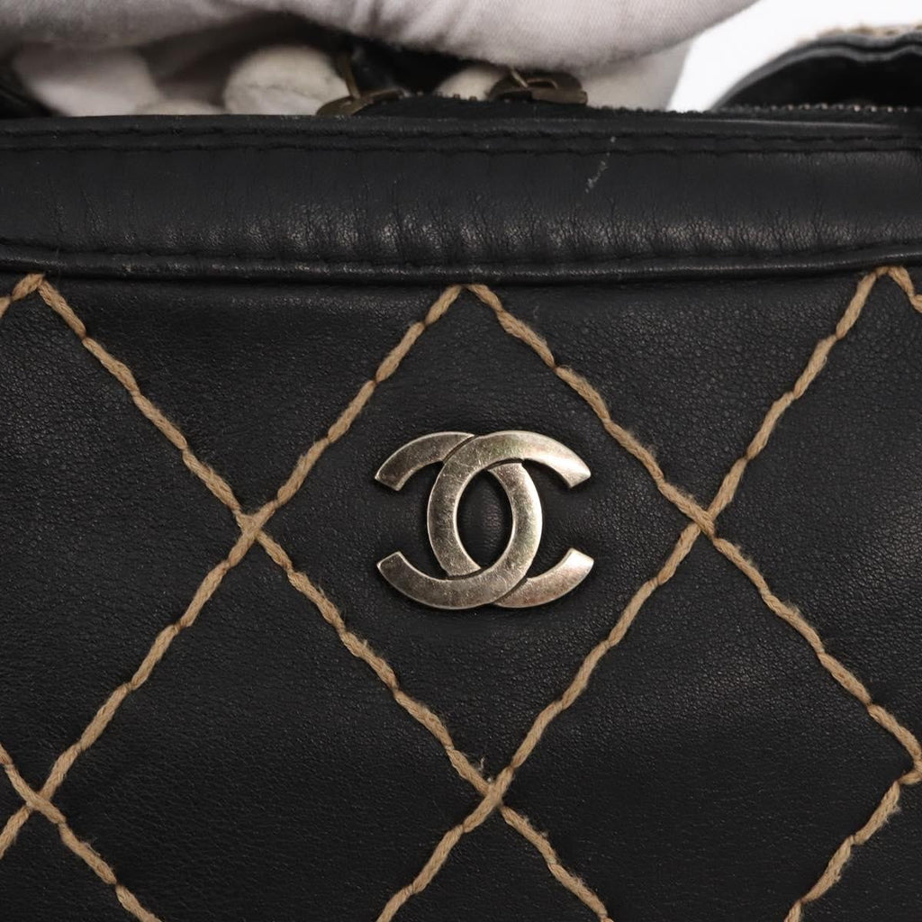 Chanel Surpique Zip Around Satchel Quilted Leather Black Leather Handbag (Pre-Owned)
