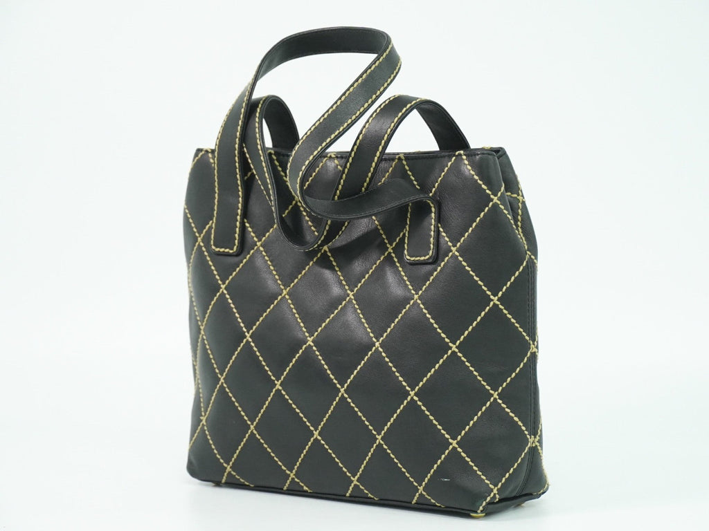 Chanel Surpique Tote Quilted Leather Black Leather Handbag (Pre-Owned)
