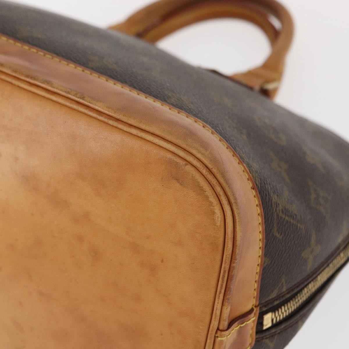 Louis Vuitton Alma Handbag Monogram Canvas Brown Canvas Handbag (Pre-Owned)