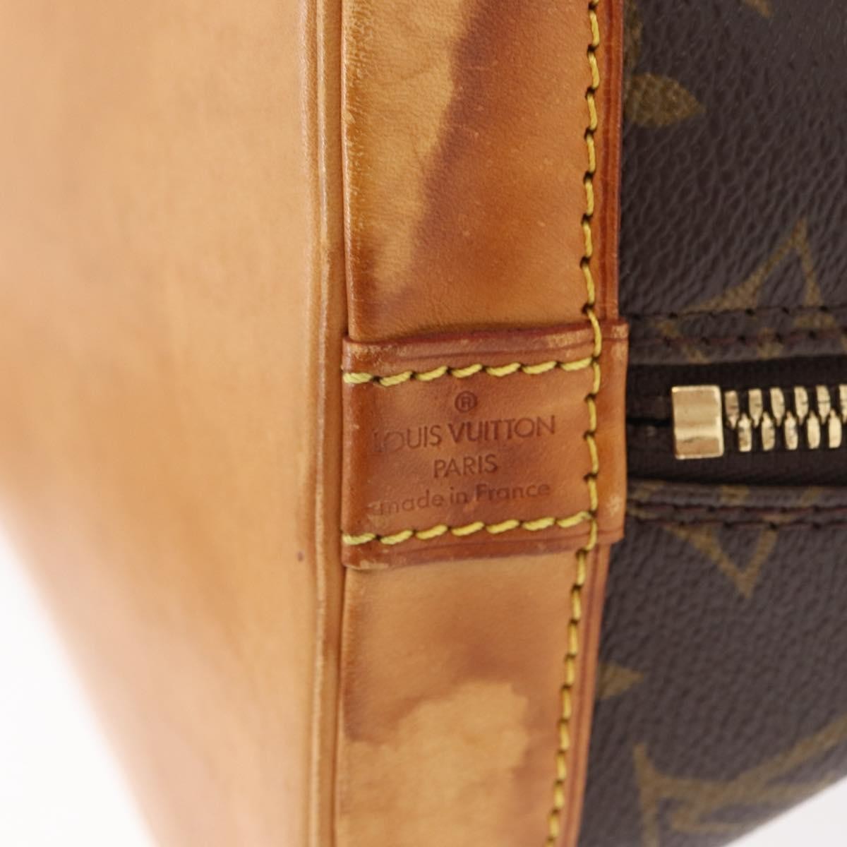 Louis Vuitton Alma Handbag Monogram Canvas Brown Canvas Handbag (Pre-Owned)