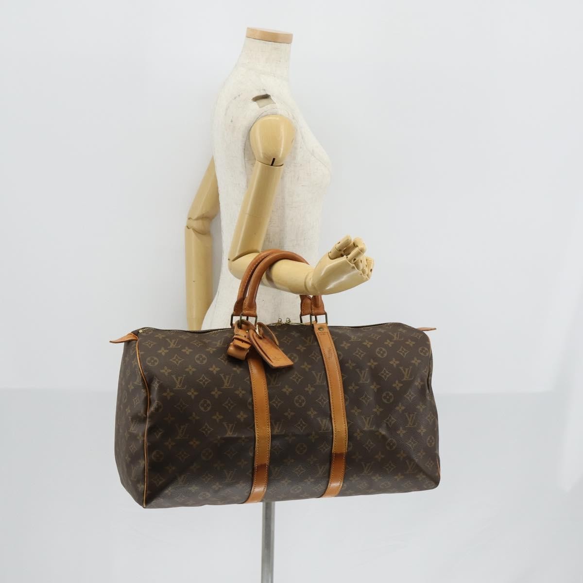 Louis Vuitton Keepall Bag Monogram Canvas Brown Canvas Travel Bag Bag (Pre-Owned)