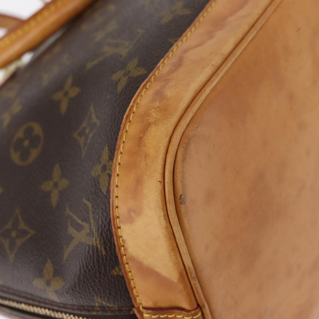 Louis Vuitton Alma Handbag Monogram Canvas Brown Canvas Handbag (Pre-Owned)