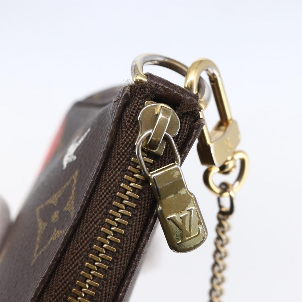 Louis Vuitton Pochette Accessoires Limited Edition Christmas Animation Monogram Canvas Brown Canvas Clutche & Pouche Bag (Pre-Owned)