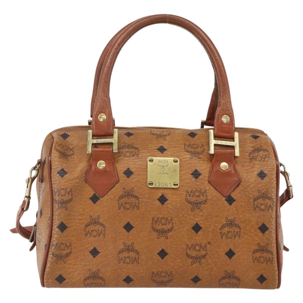 MCM Visetos Logogramme Handbag Canvas And Leather Brown Pvc Handbag (Pre-Owned)