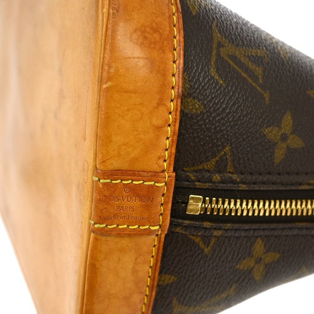 Louis Vuitton Alma Handbag Monogram Canvas Brown Canvas Handbag (Pre-Owned)