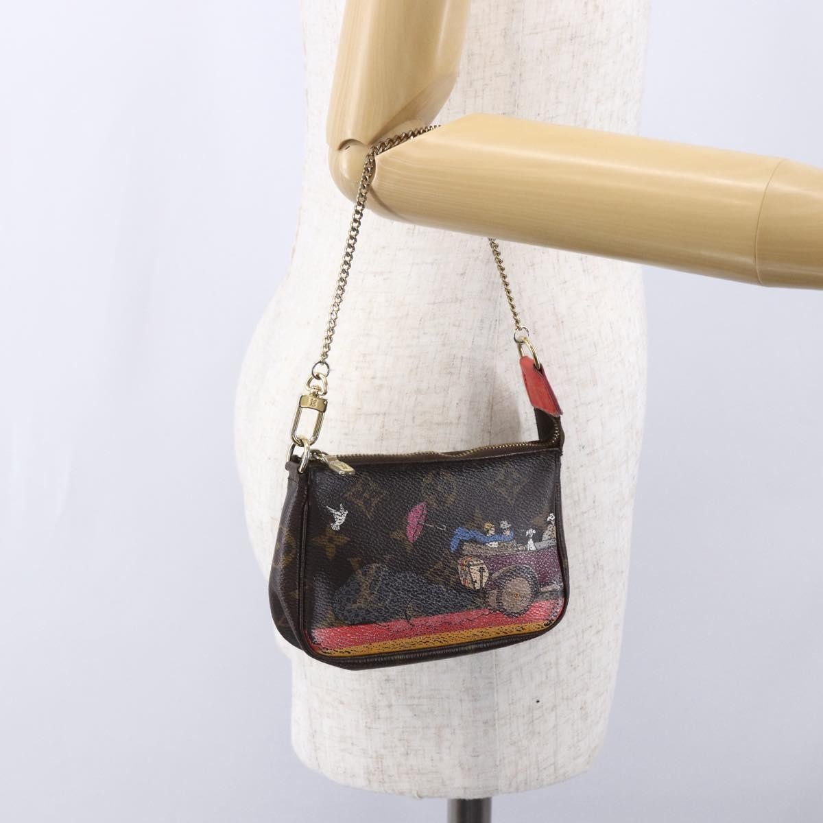 Louis Vuitton Pochette Accessoires Limited Edition Christmas Animation Monogram Canvas Brown Canvas Clutche & Pouche Bag (Pre-Owned)
