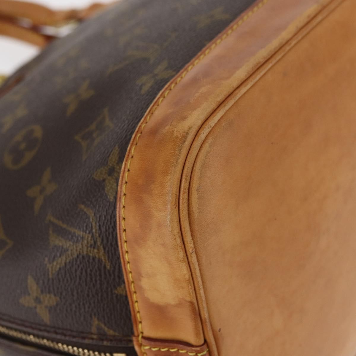 Louis Vuitton Alma Handbag Monogram Canvas Brown Canvas Handbag (Pre-Owned)