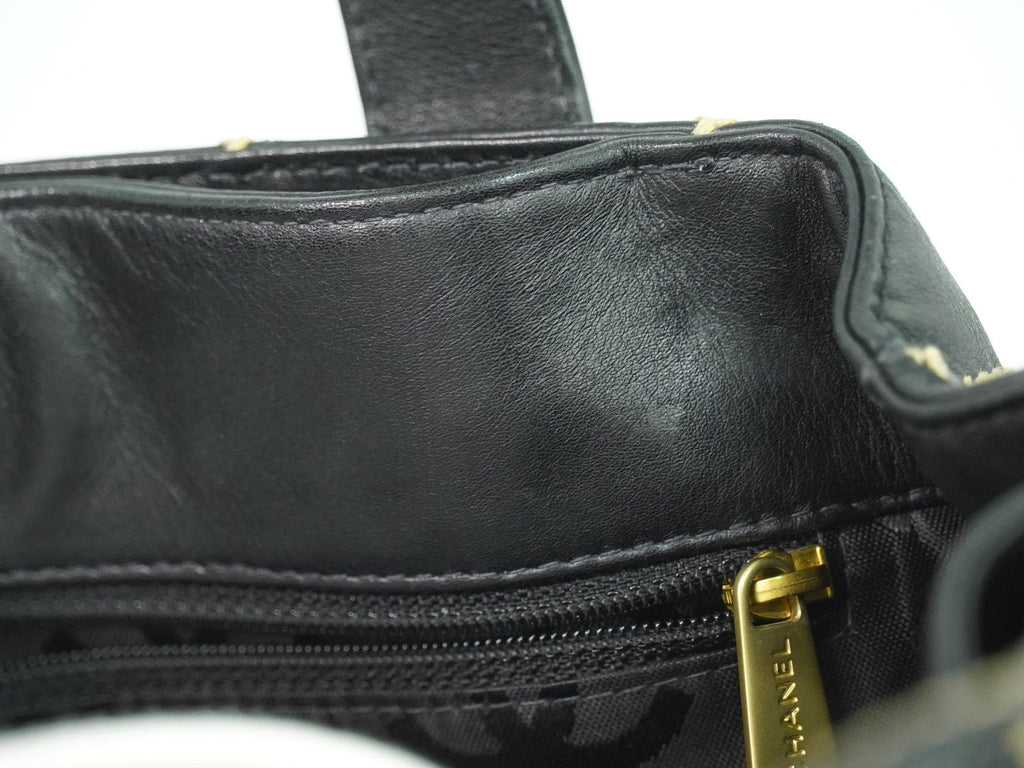 Chanel Surpique Tote Quilted Leather Black Leather Handbag (Pre-Owned)