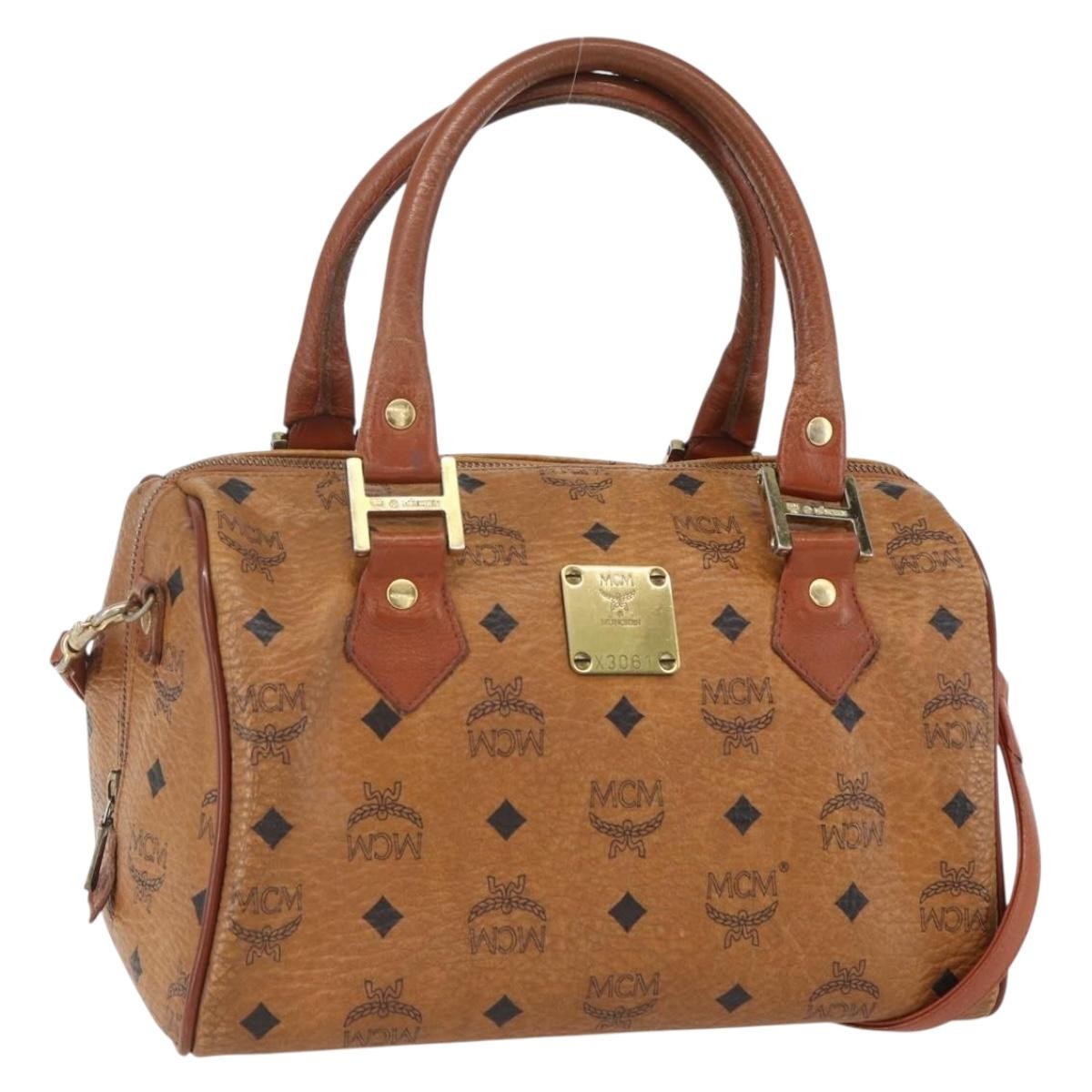 MCM Visetos Logogramme Handbag Canvas And Leather Brown Pvc Handbag (Pre-Owned)