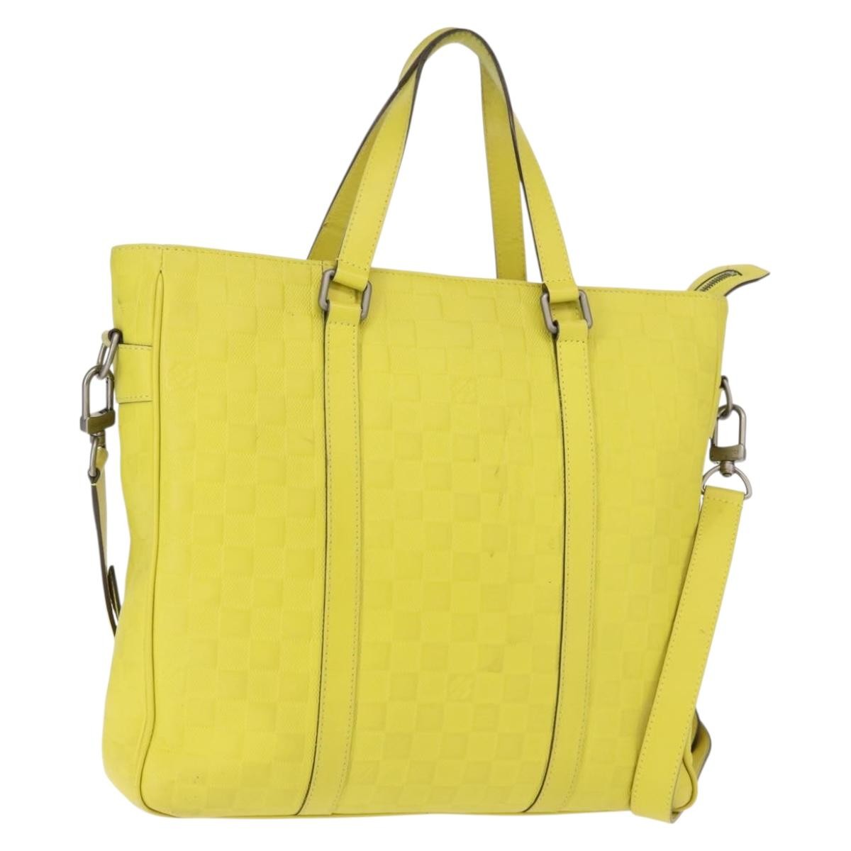 Louis Vuitton Tadao Handbag Damier Infini Leather Yellow Leather Handbag (Pre-Owned)