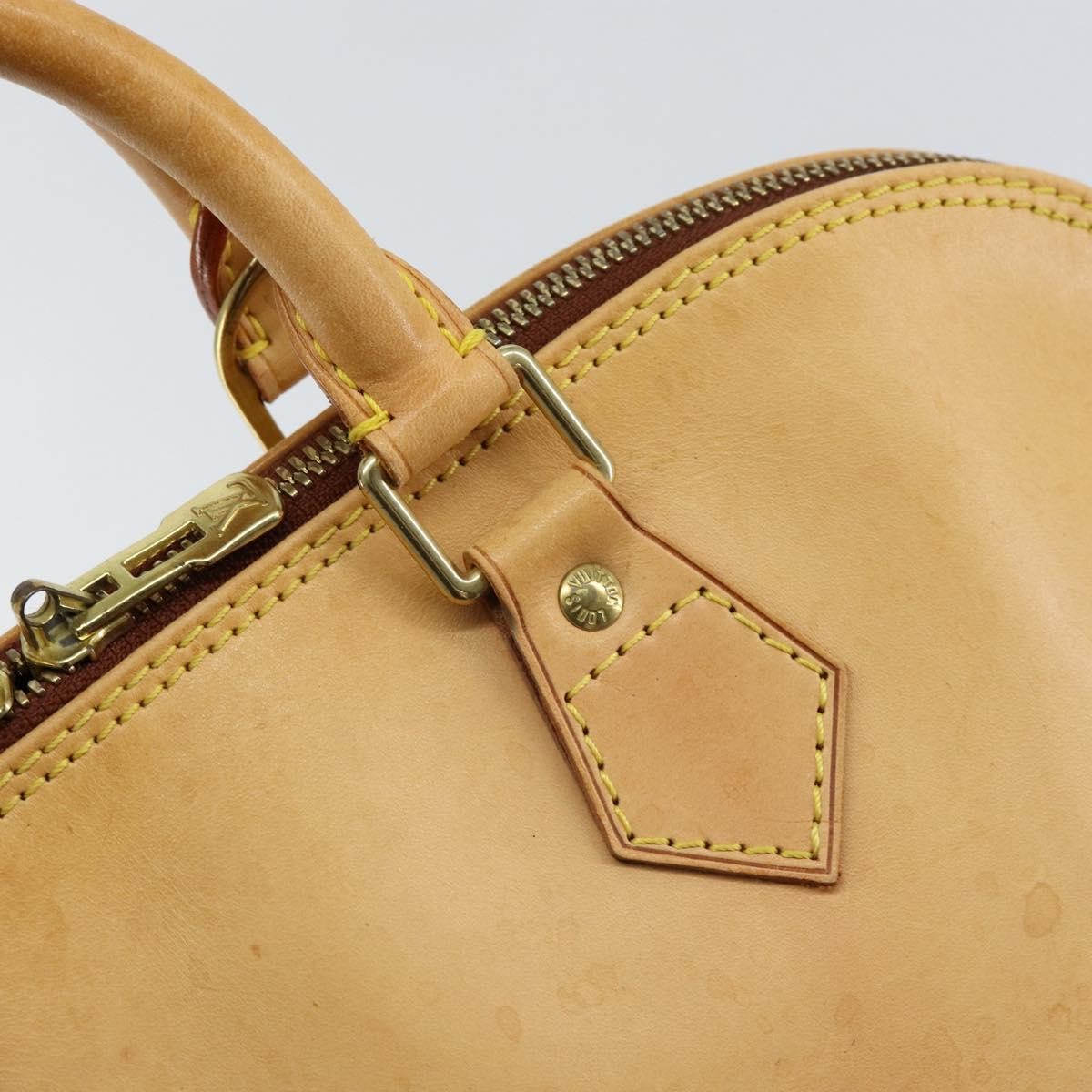 Louis Vuitton Alma Handbag Nomade Leather Beige Leather Handbag (Pre-Owned)