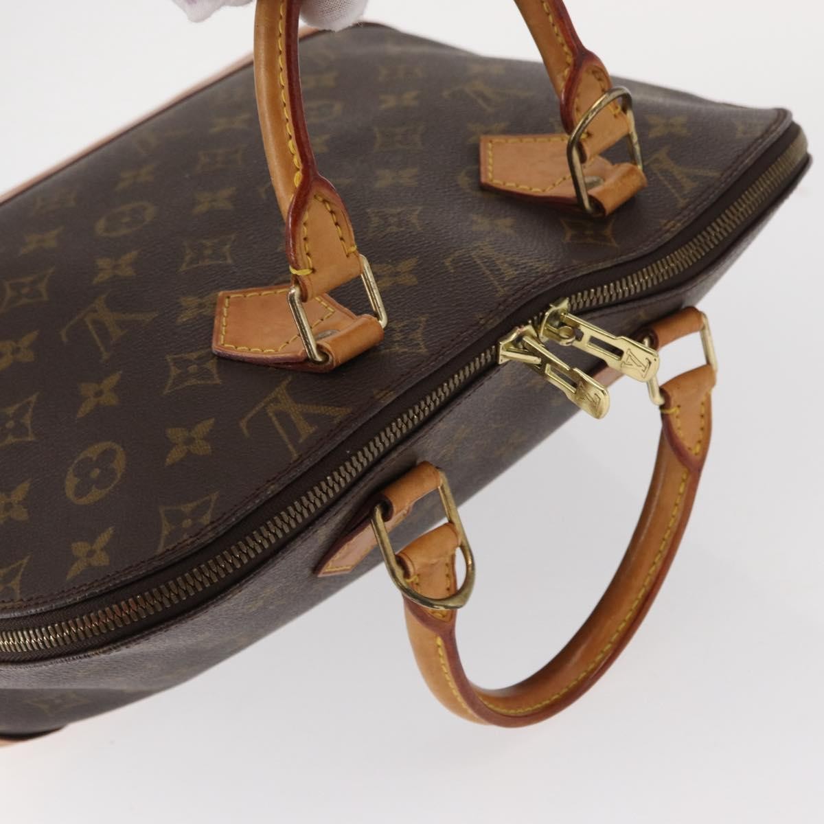 Louis Vuitton Alma Handbag Monogram Canvas Brown Canvas Handbag (Pre-Owned)