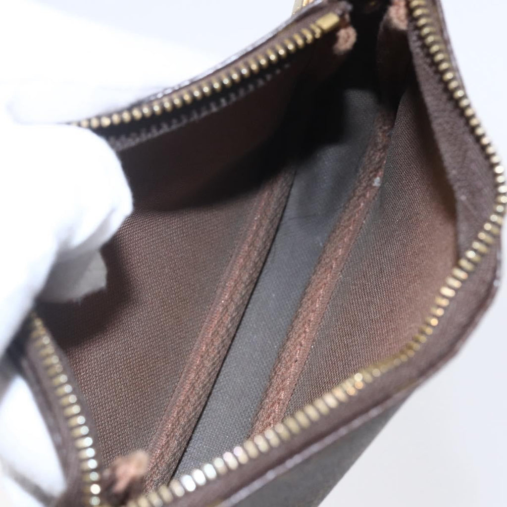 Louis Vuitton Pochette Accessoires Limited Edition Christmas Animation Monogram Canvas Brown Canvas Clutche & Pouche Bag (Pre-Owned)