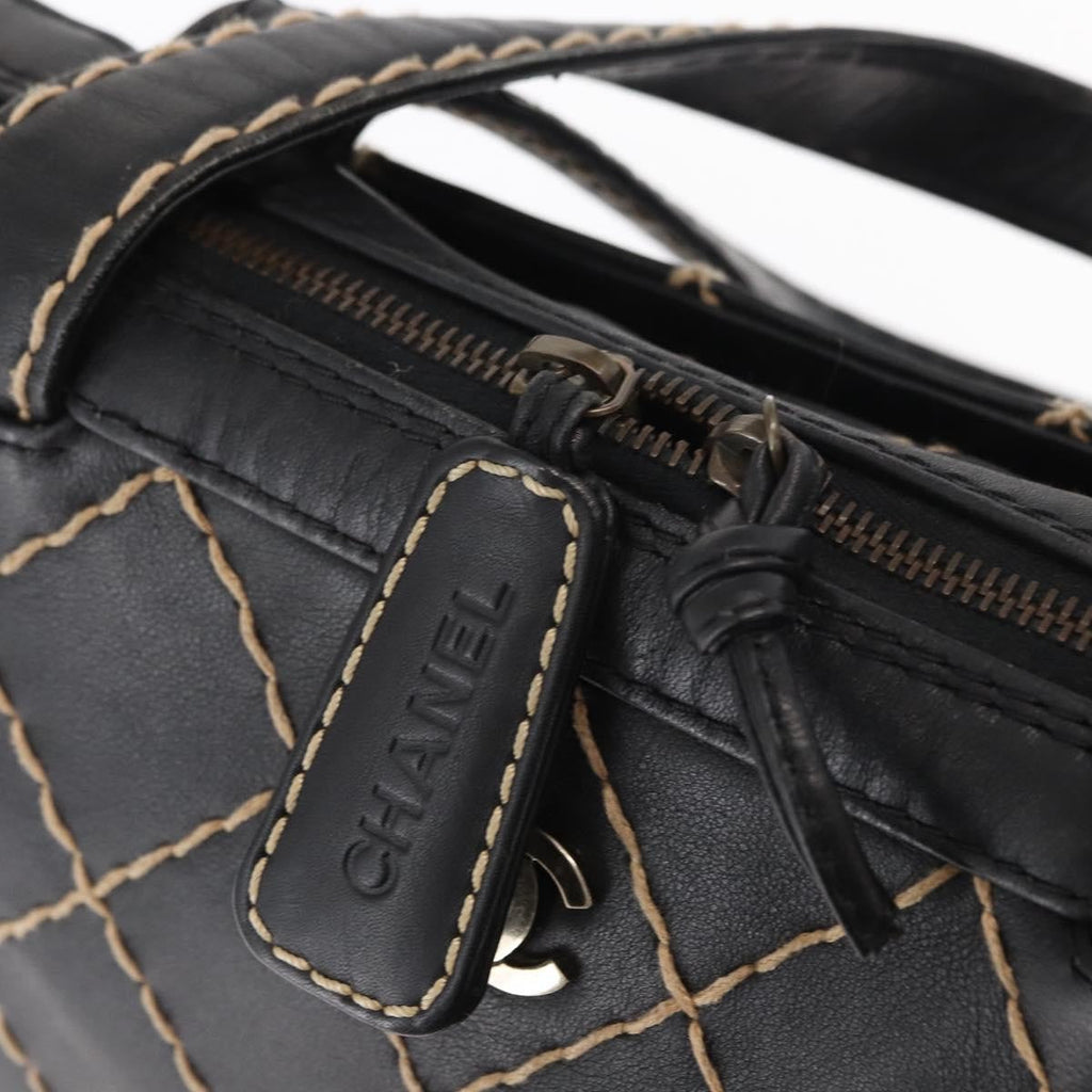 Chanel Surpique Zip Around Satchel Quilted Leather Black Leather Handbag (Pre-Owned)